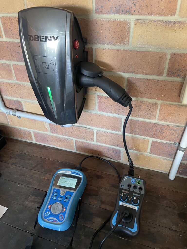 Homeowner Stepping Back From Sparking Fuse Box For Safety.